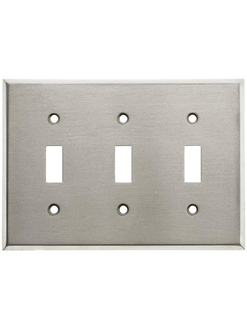 Classic triple toggle switch plate in pressed brass or steel house of